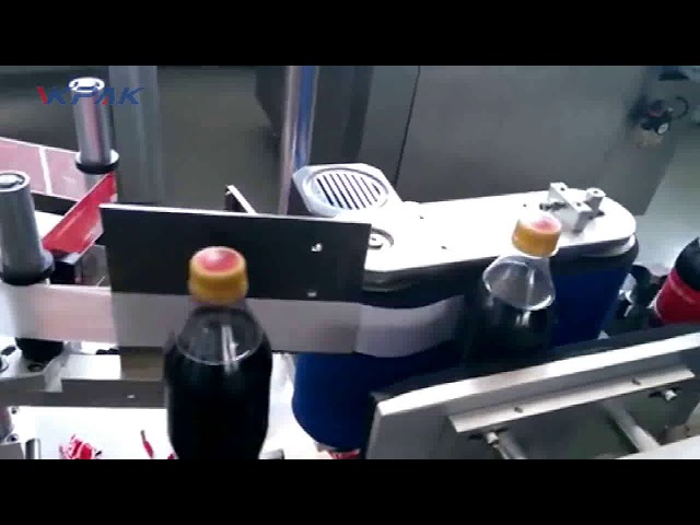 Автоматическая этикетировочная машина для бутылок колы